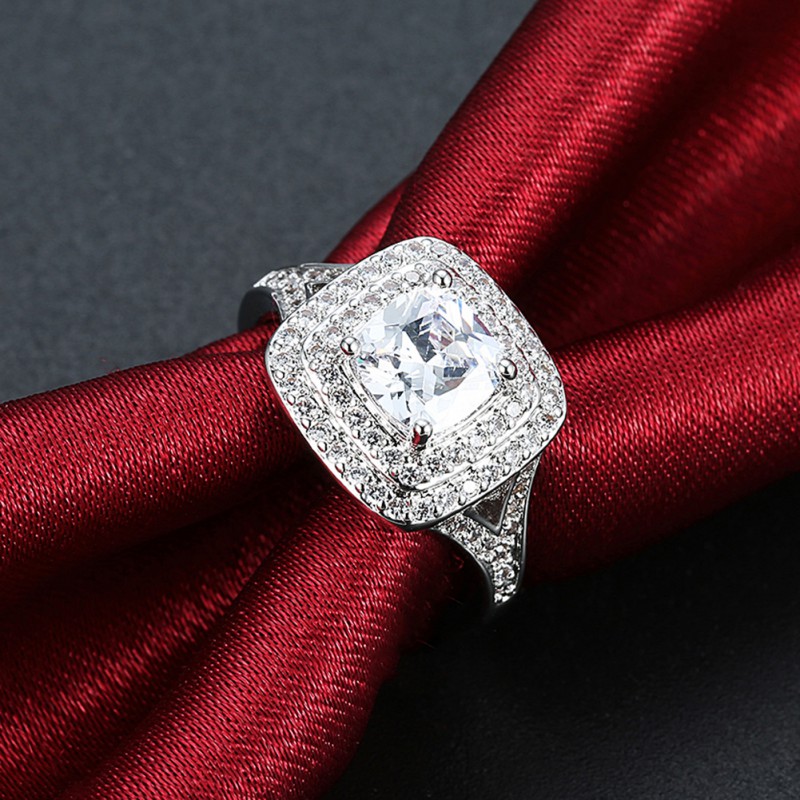 BRASS RING WITH ZIRCON STONE