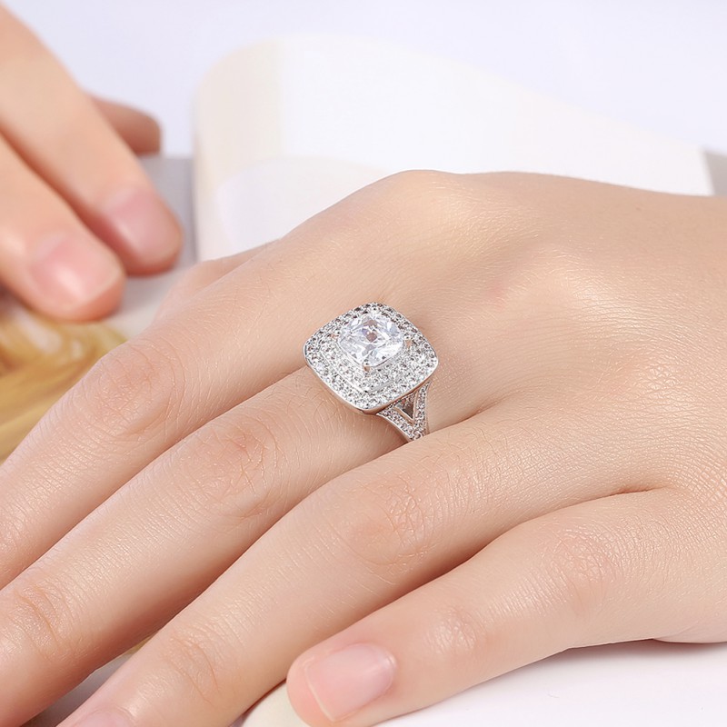 BRASS RING WITH ZIRCON STONE